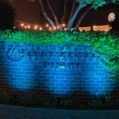 Blue color-changing lighting adds branding and ambiance this commercial entrance. Photo